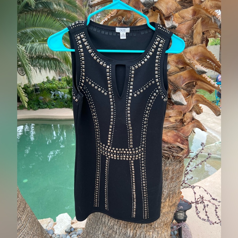 Black with silver accents top.